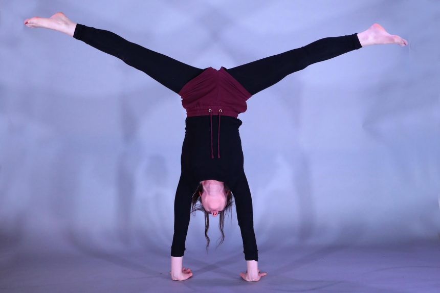Woman doing a handstand